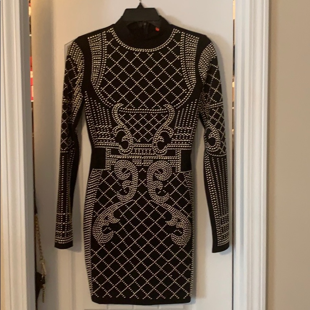 Black bodycon dress with gold round studs